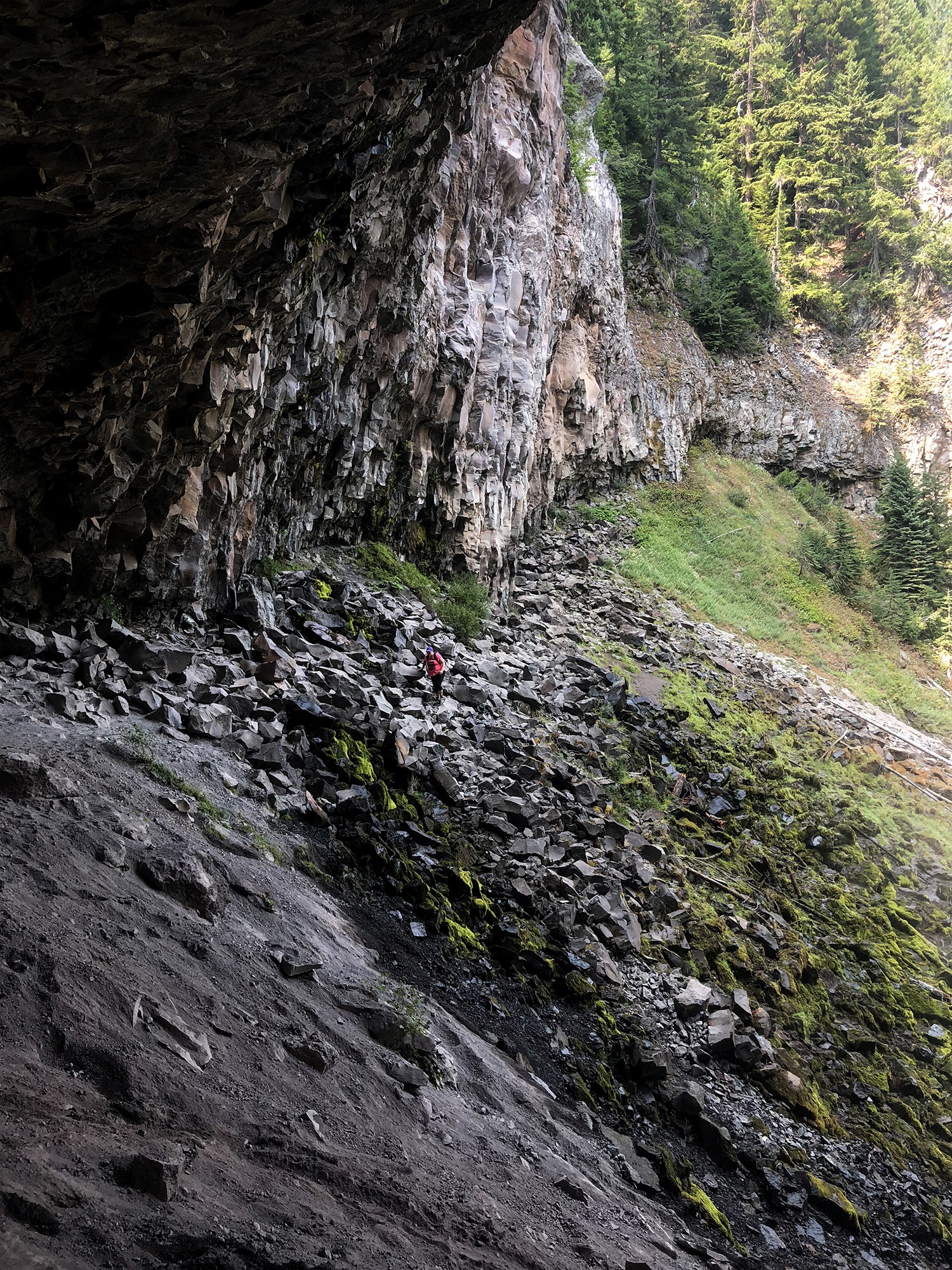 rocks on the side of the waterfall