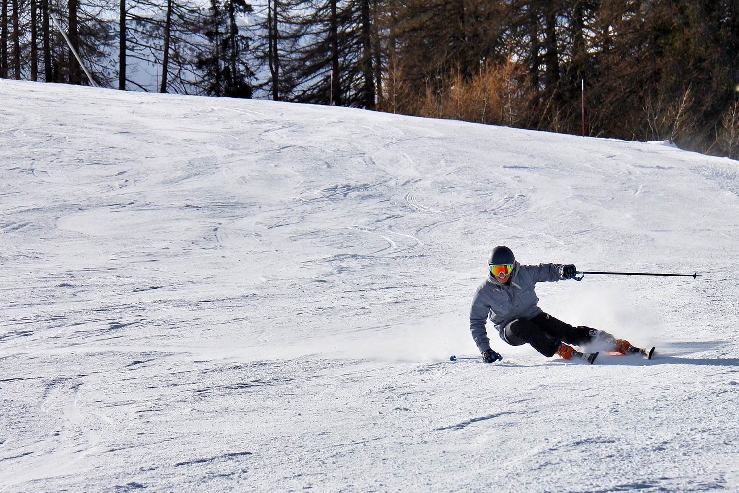 girl skiing down a hill